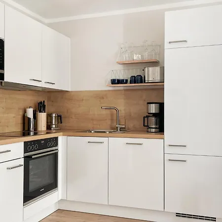 In With Kitchen Tossens